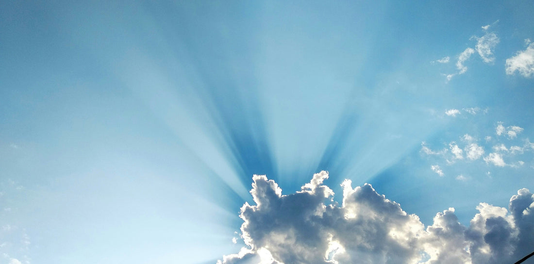Sun rays scattering around a cloud